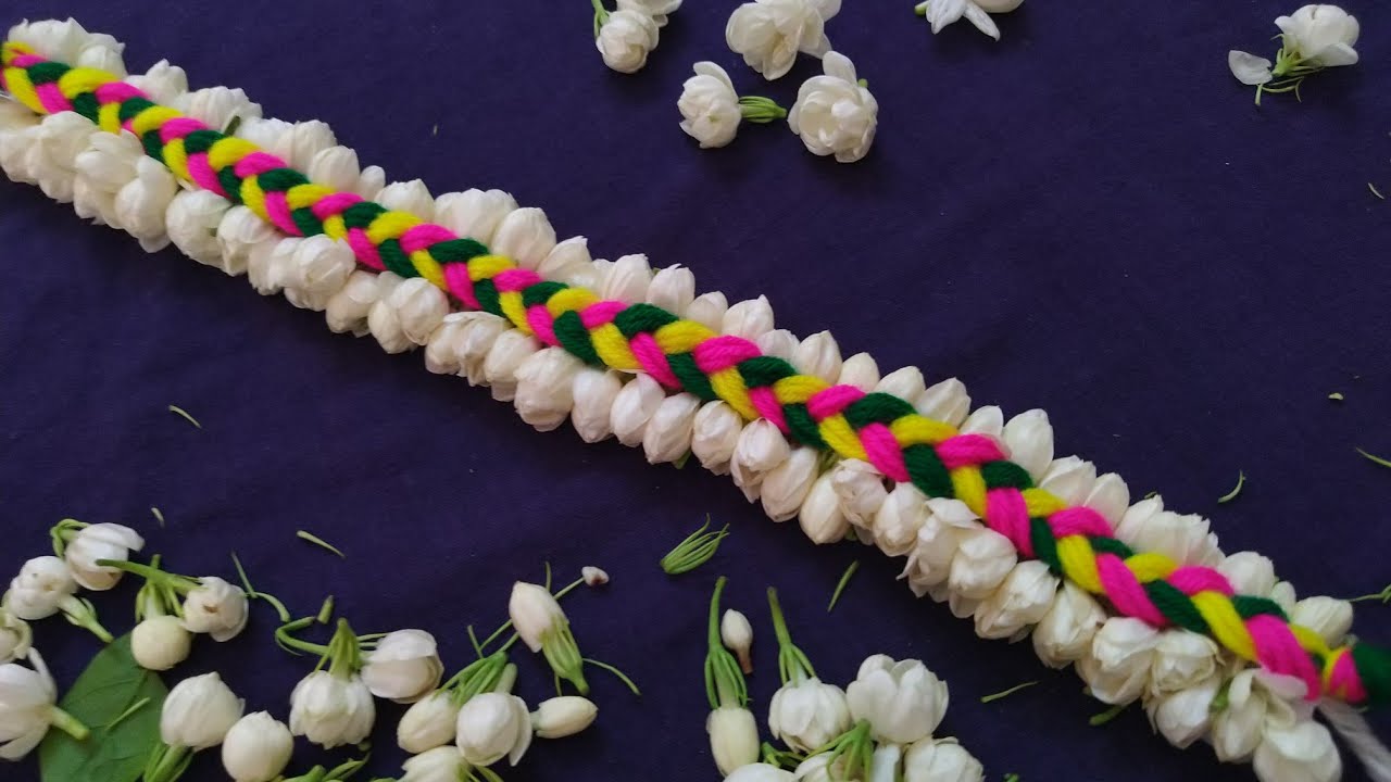 Garland making with Jasmine flowers& yellow,pink,green woolen threads//trending Garland making ideas