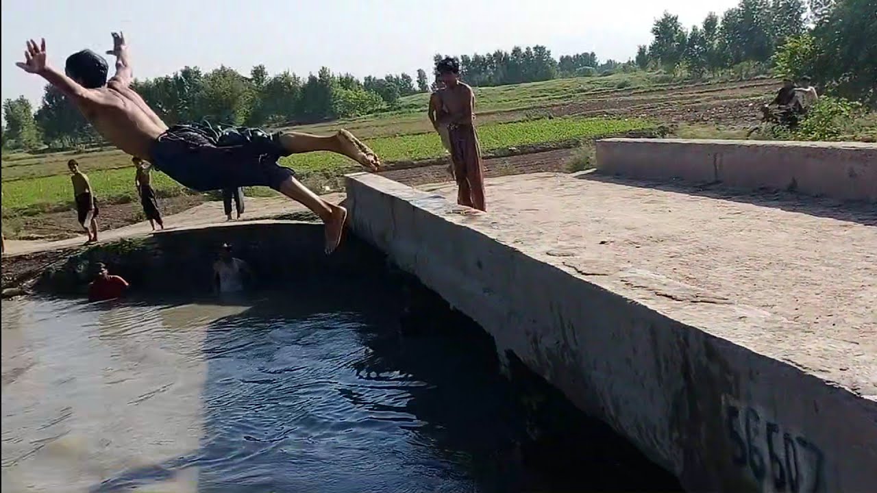 Swimming in canal on a hot day || local boys swimming peshawar || By Travels of Khyber