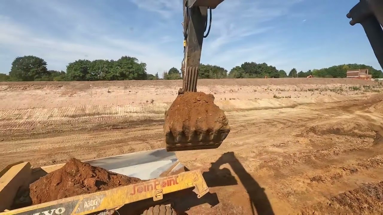 Volvo excavator bench digging sand (pt 1)