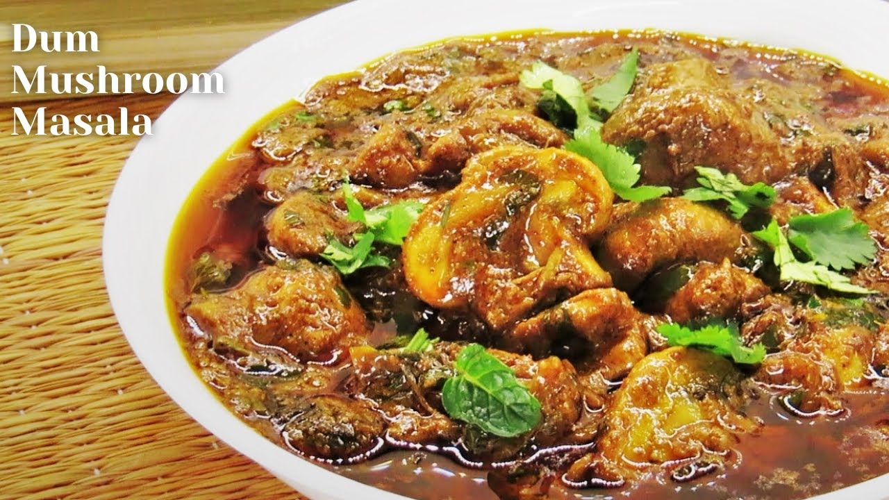Dum Mushroom Masala.Spicy mushroom curry cooked in Hyderabadi style.Easy vegetarian recipe.