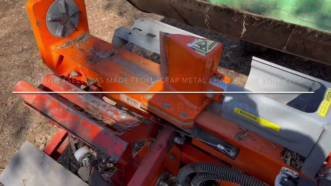Yardmax 28 ton log splitter with custom lift table. John Deere 2520