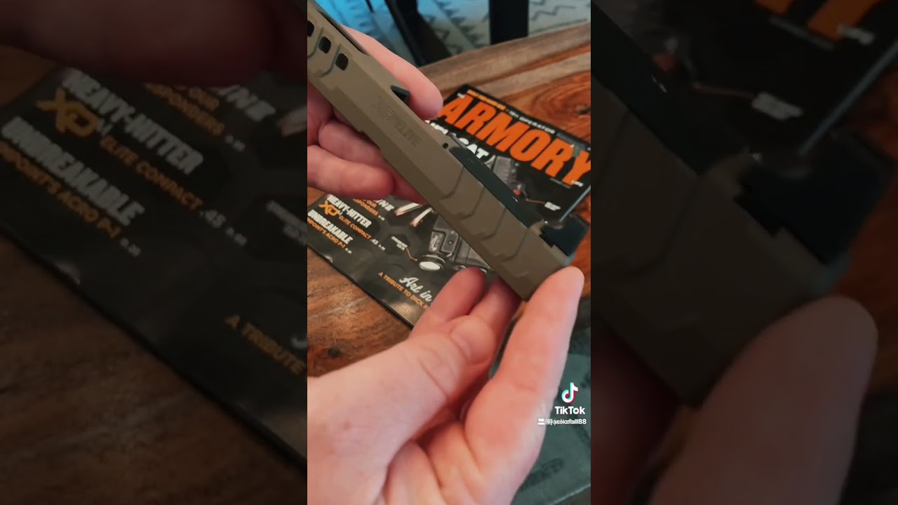 Custom slide cuts and Cherakote done by Billet Armory.
