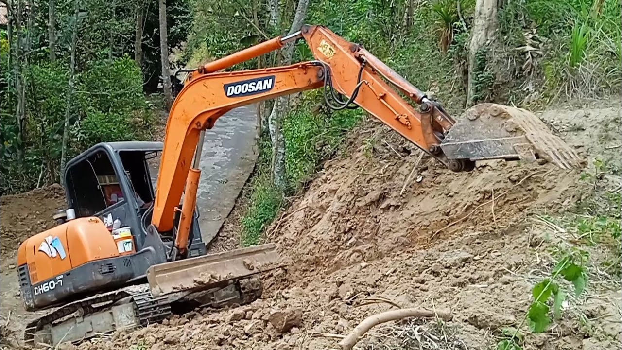 Doosan DH60-7 Excavator Working Digging and Climbing a Hill.