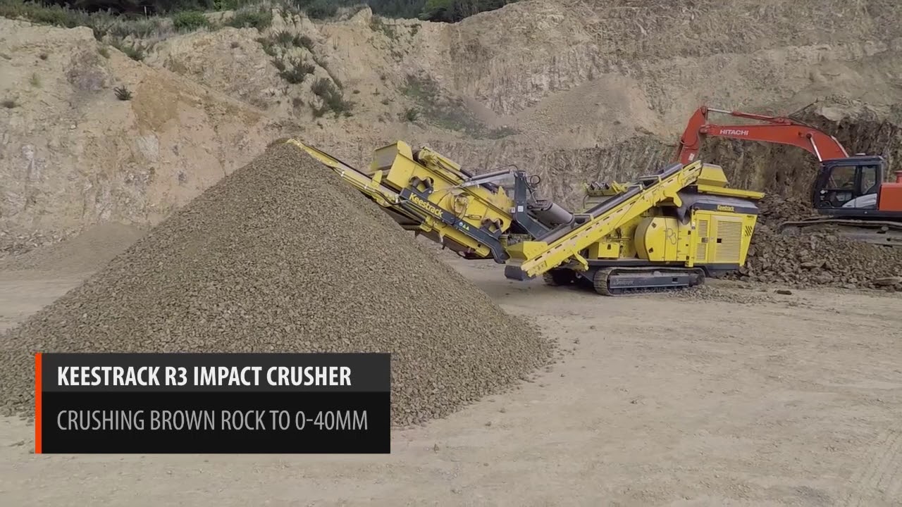 Machine crushing blue, brown rock - Keestrack R3 - Equip2 New Zealand