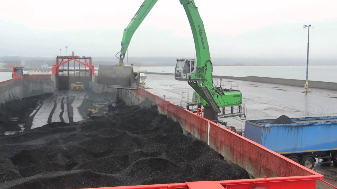 Sennebogen 860 with Exstel EXB-SCHL 5.0 m3