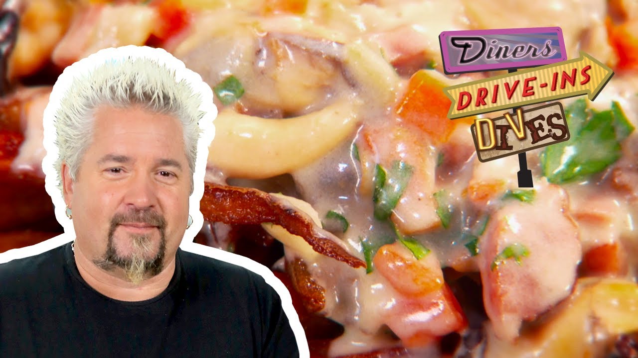 Seafood CHOWDER-Topped French FRIES | Diners, Drive-ins and Dives with Guy Fieri | Food Network