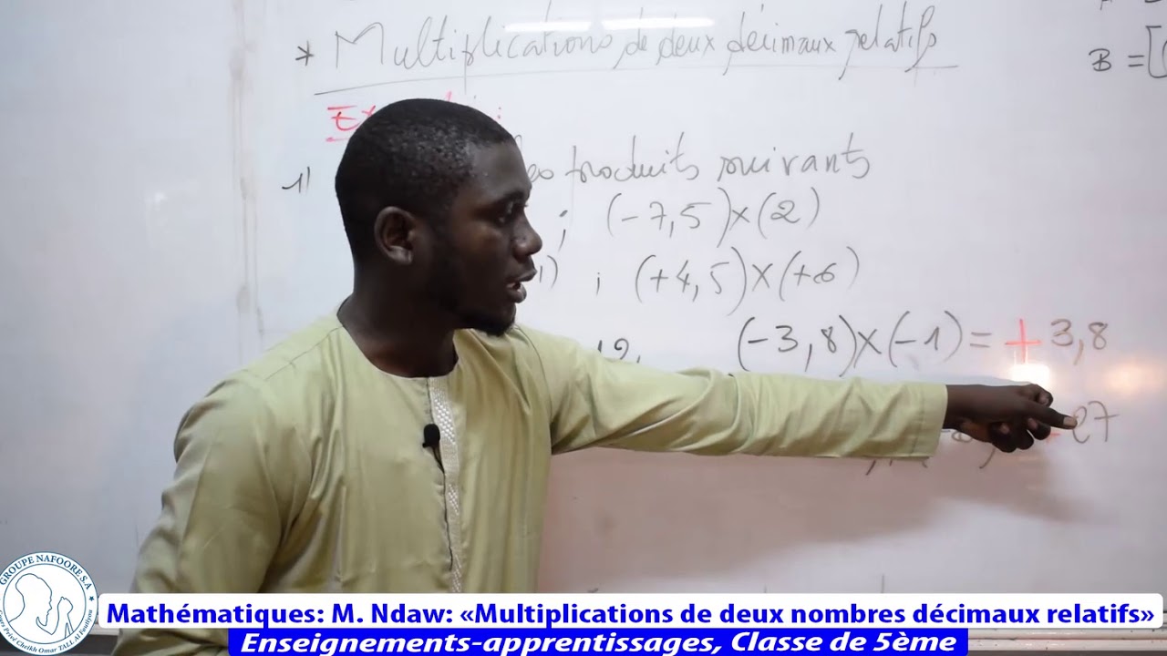 Mathématiques: M. Ndaw: Multiplication de deux nombres décimaux relatifs