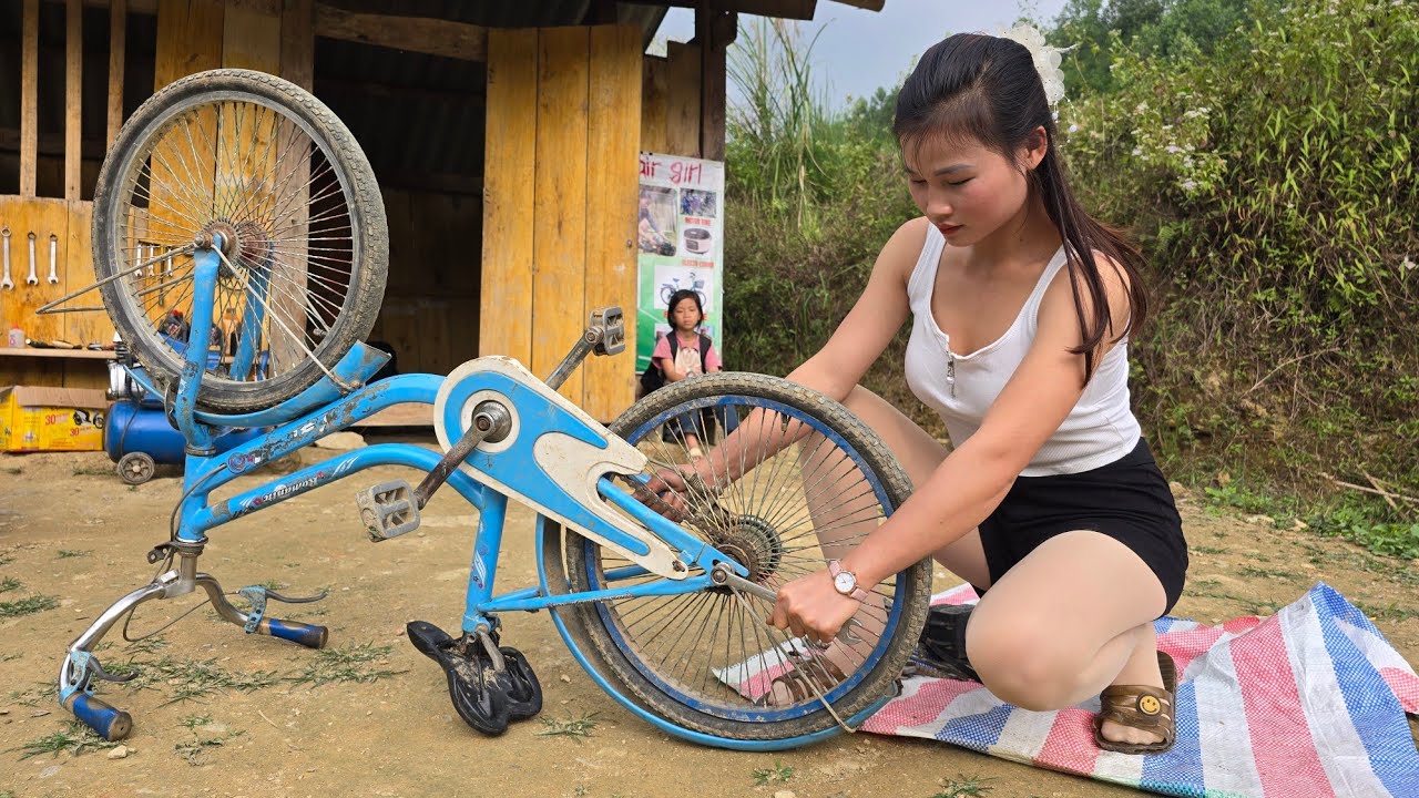 This lovely girl repairs bicycle tires for students for free.and help farmers repair their plows.