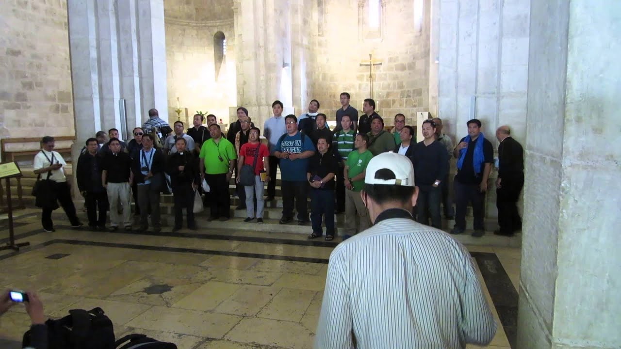 Chorus of Philippines monks sings at the place where the Madonna was born (Jerusalem)