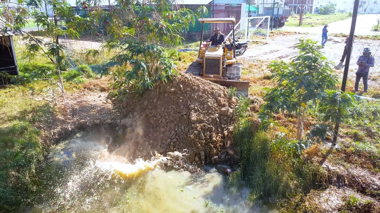 Start and complete the nice project bulldozer push soil build the new road