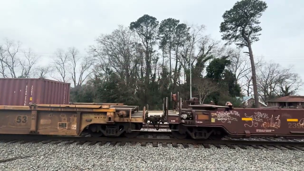 NS 242 off to Charleston on 3/3/26 with horn salute and big wave from conductor Gibbs
