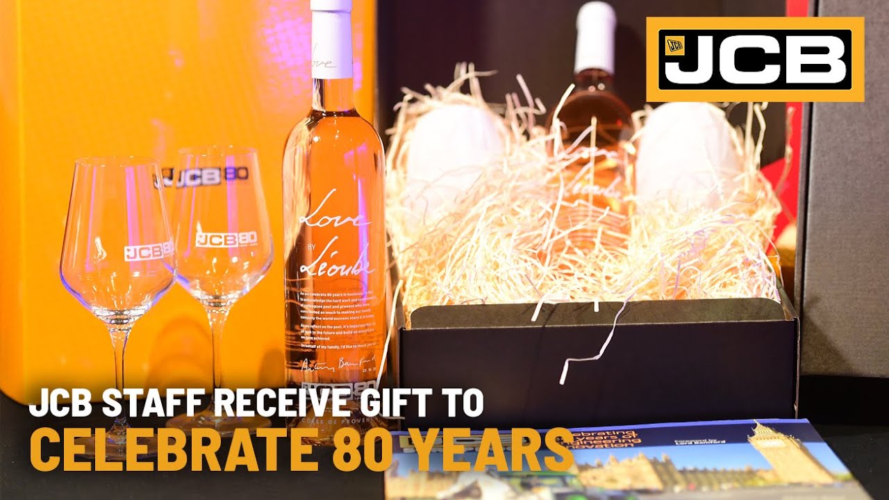 JCB staff celebrate 80 Years with special gift