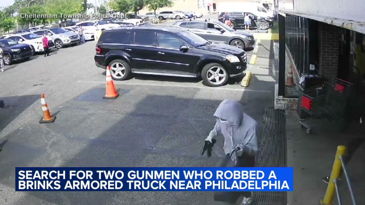 Police searches for two gunmen who robbed Brinks armored truck near PA