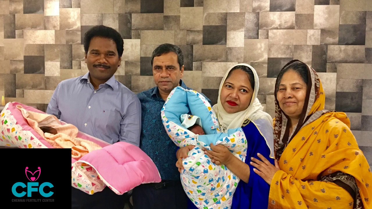 Ivf couple carrying twin cute ivf babies from chennai Fertility center-Dr.VM.Thomas