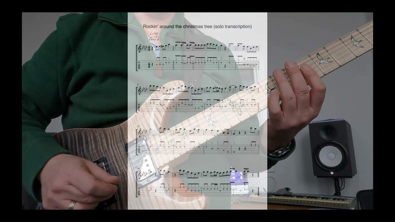 Lesson: Rockin' around the Christmas tree (solo); playalong and tabs included