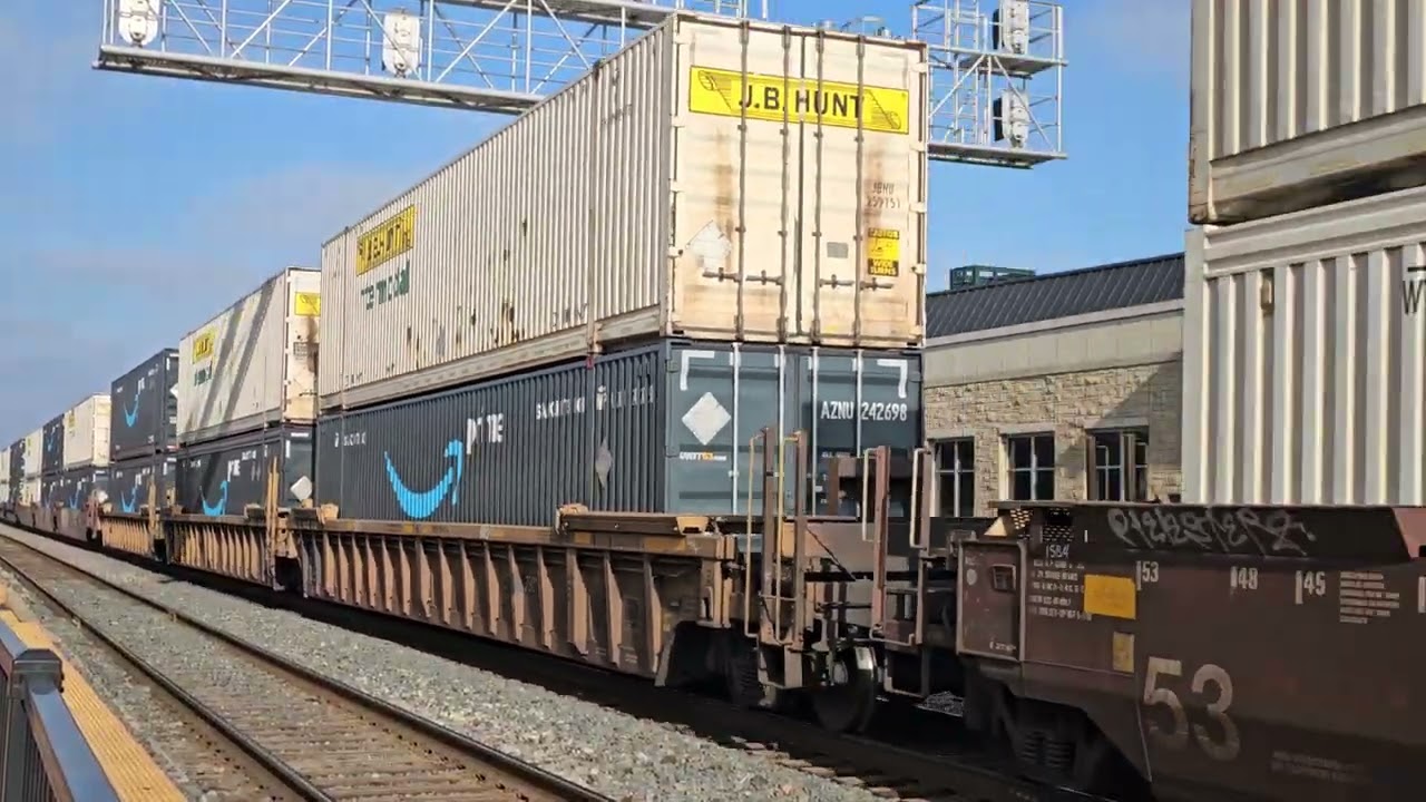 WB BNSF INTERMODAL PASSES UD TOWER Joliet il with lots of Amazon freight 010626