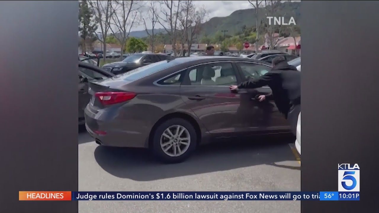 Terrifying video shows carjacker's destructive rampage at a Southern California parking lot