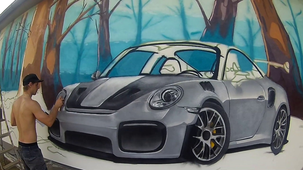 Graffiti malba Porsche 911 GT2 RS na stěnu garáže