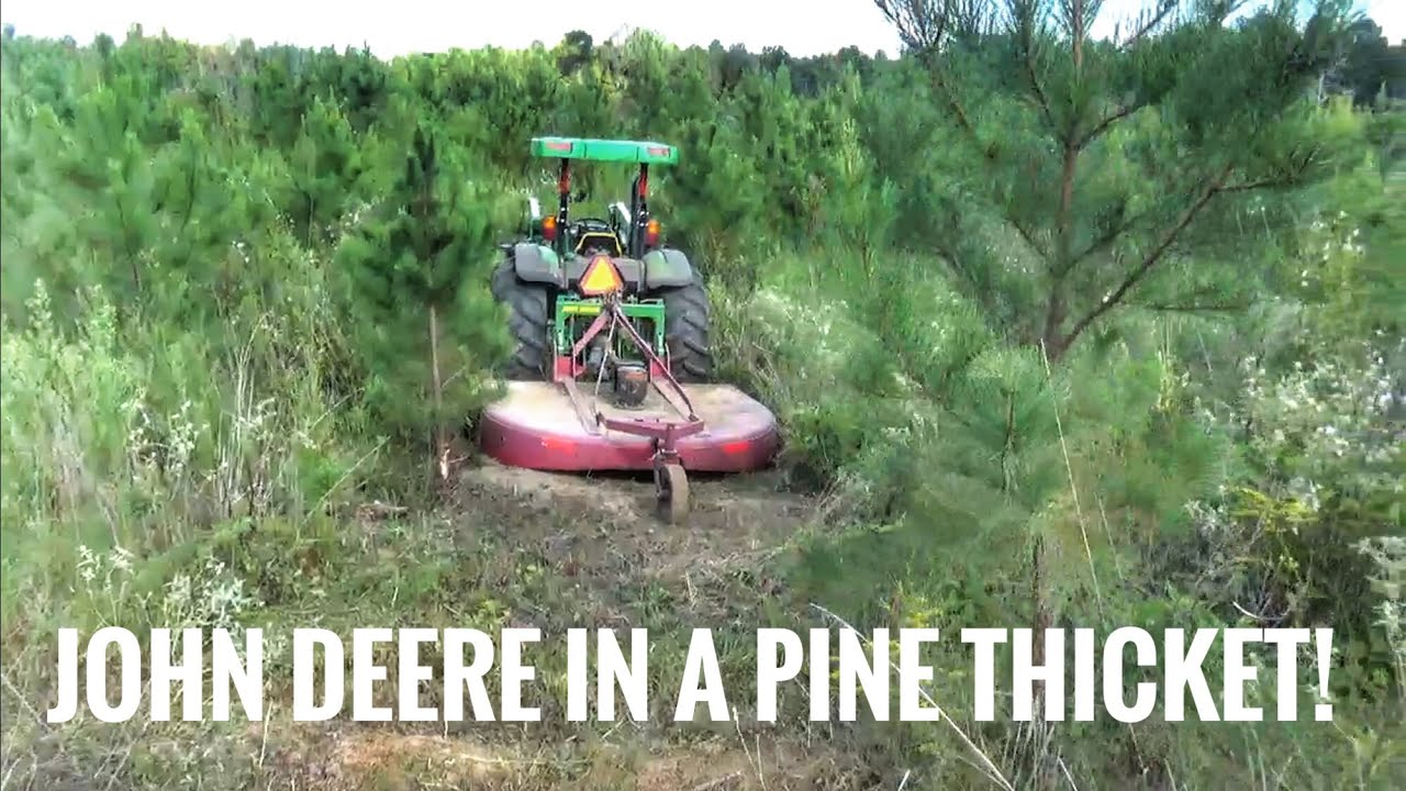 John Deere 5075E Brushhogging some rough stuff