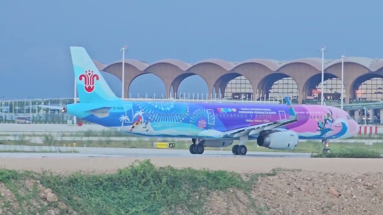Perfect VIETNAM AIRLINES VN A396 Landing and CHINA INTERNATIONAL CONSUMER PRODUCTS EXPO Take off