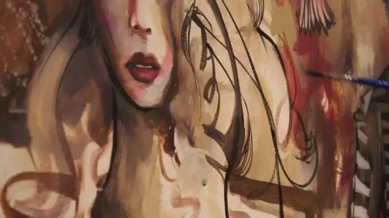 Daniel J Kirk painting a mural at EPCOR CENTRE