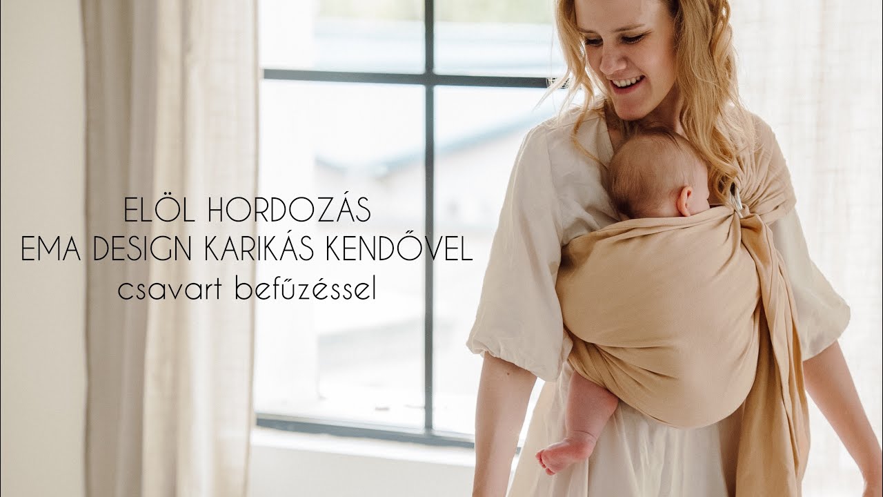 El&ouml;l hordoz&aacute;s ema design karik&aacute;s kendővel, csavart befűz&eacute;ssel