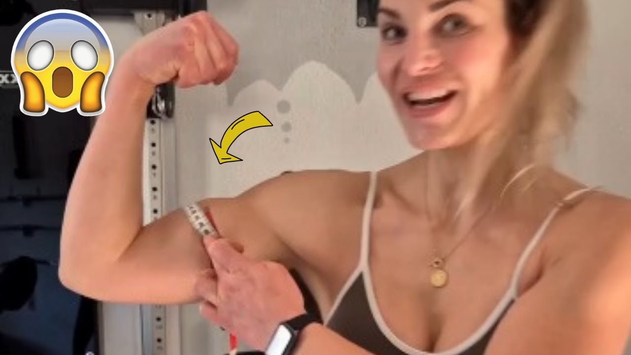 This beautiful girl is measuring her lovely biceps!