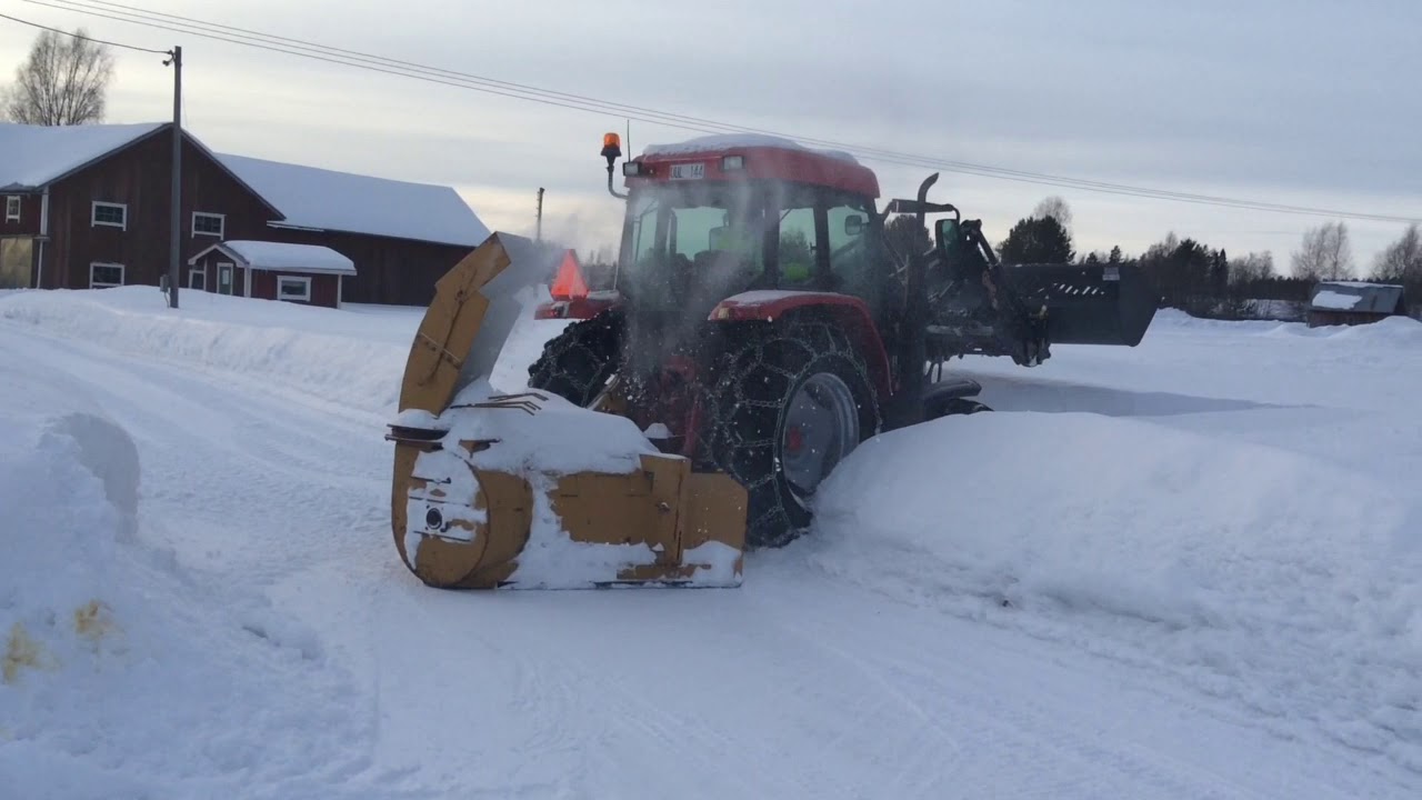 McCormick CX105 with a Trima TR220E snowblower