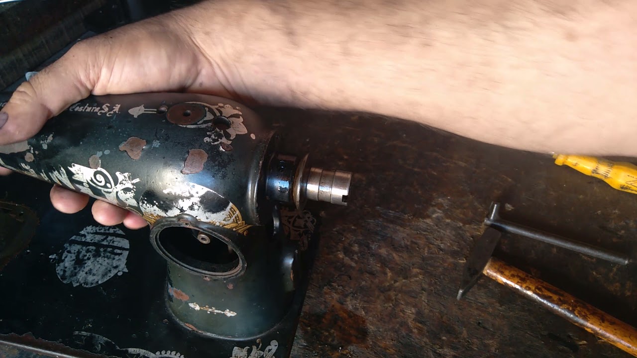 Como tirar trocar bucha receptora do volante da máquina de costura