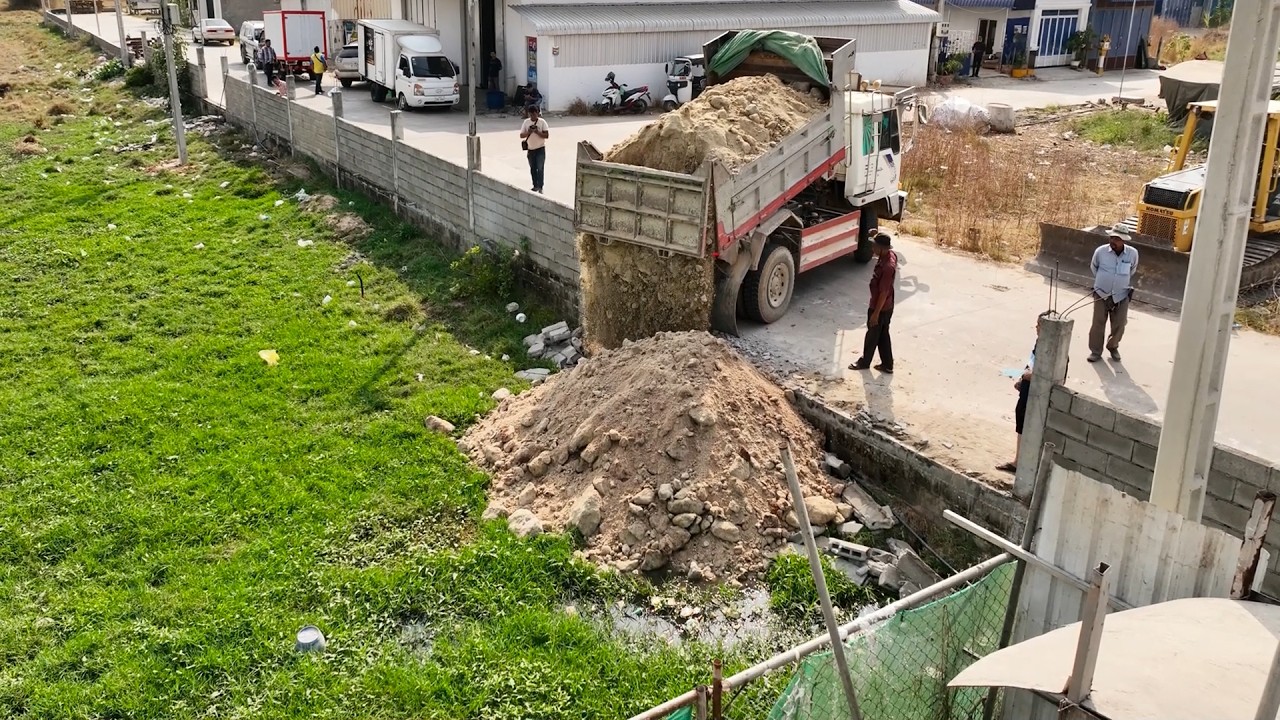 First Opening Landfill Task! Best Skill KOMATSU Bulldozer D31PX Push Soil Mix Stone WIth Trucks Work