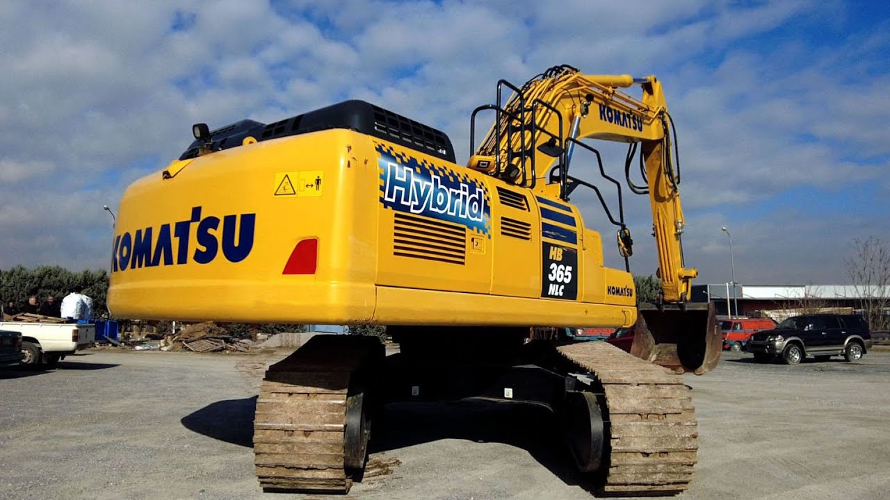 A Look Outside and Inside the Komatsu HB 365NLC Hybrid Excavator.