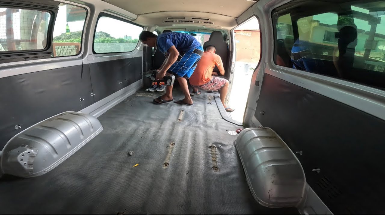 Toyota Hiace commuter decontent floor matting and headrest installation