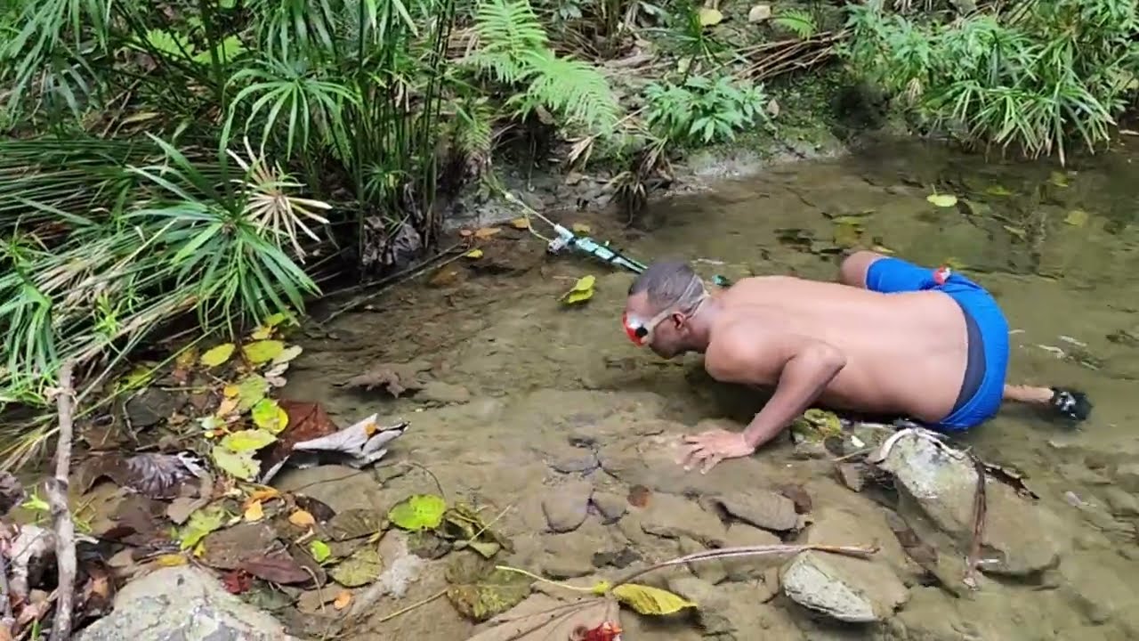 Pesca en agua cristalina Arroyo de los Guineos