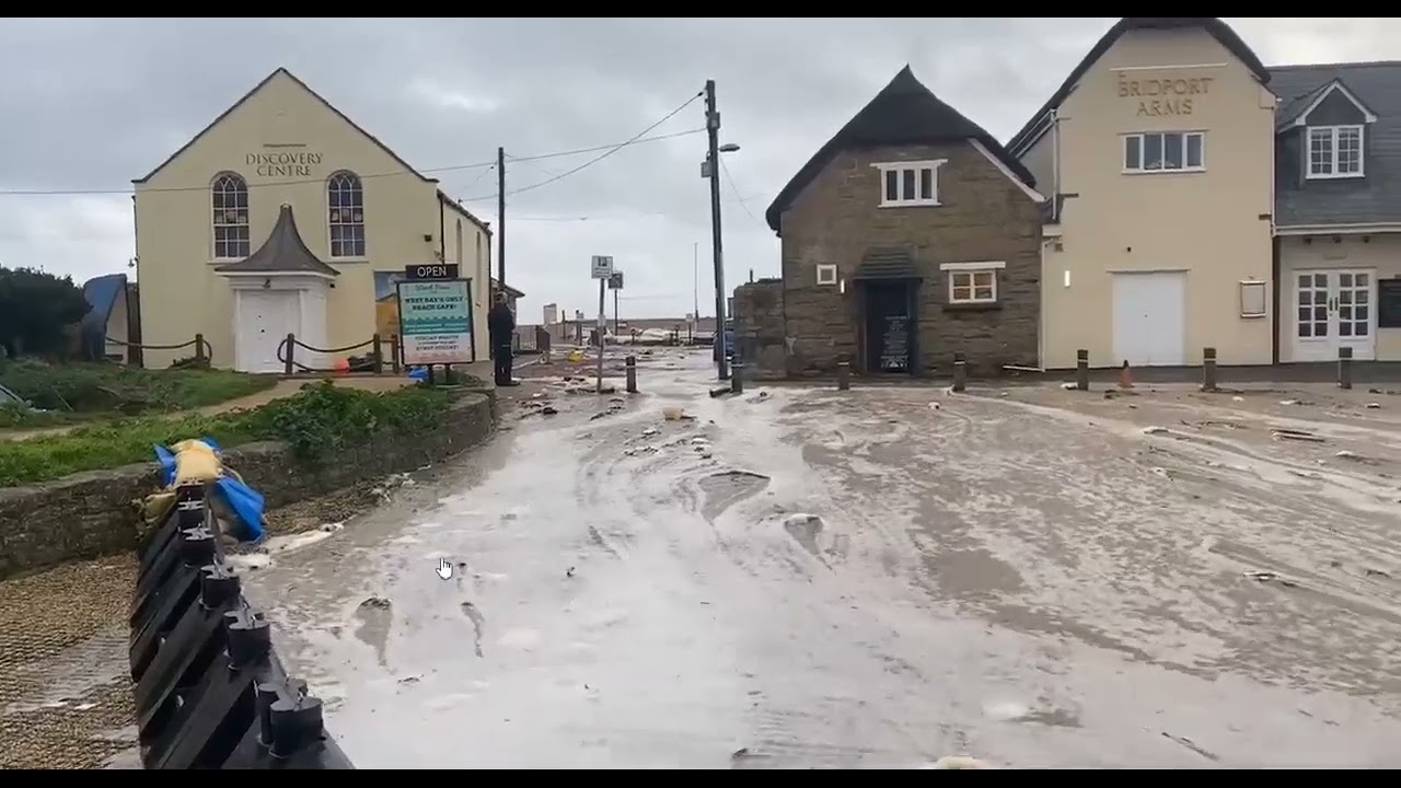Flood barriers in action West Bay, Dorset during Storm Ciaran