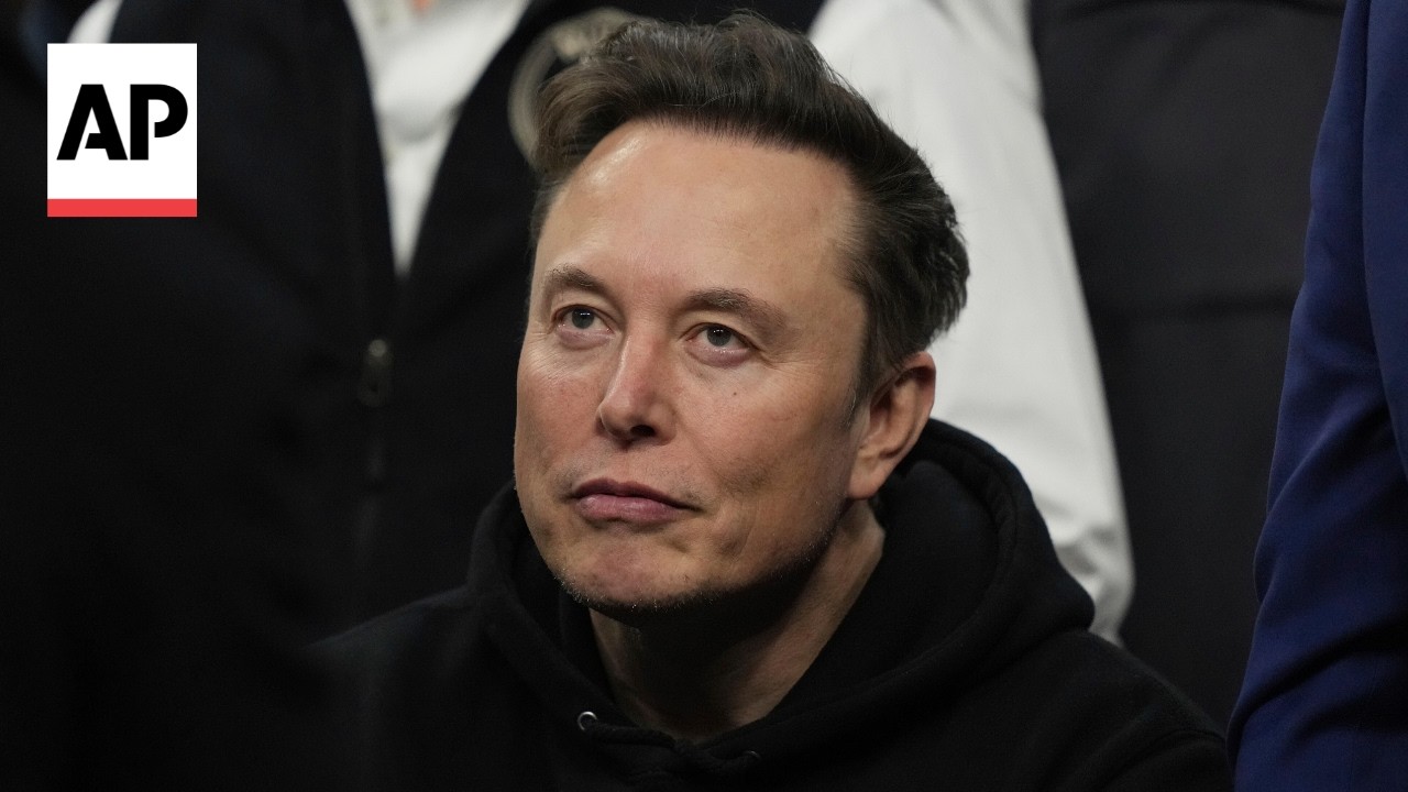 Elon Musk faces investors during SpaceX's first earnings call as a public company