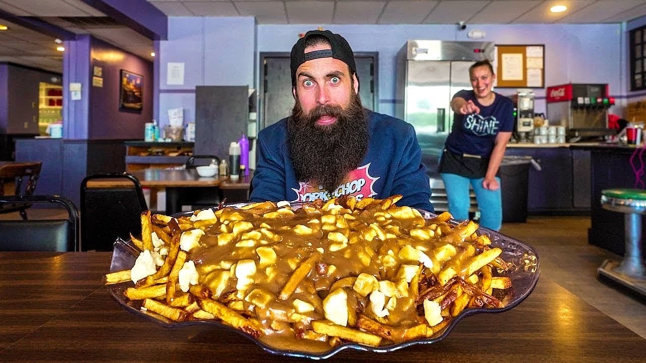 THIS POUTINE CHALLENGE HAS ONLY BEEN BEATEN 7 TIMES IN 11 YEARS! | BeardMeatsFood