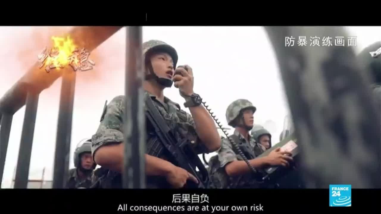 China's military warns Hong Kong protesters with propaganda video