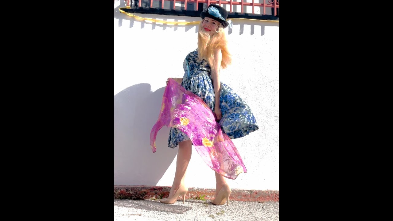 Famous blue rose dress for a windy day