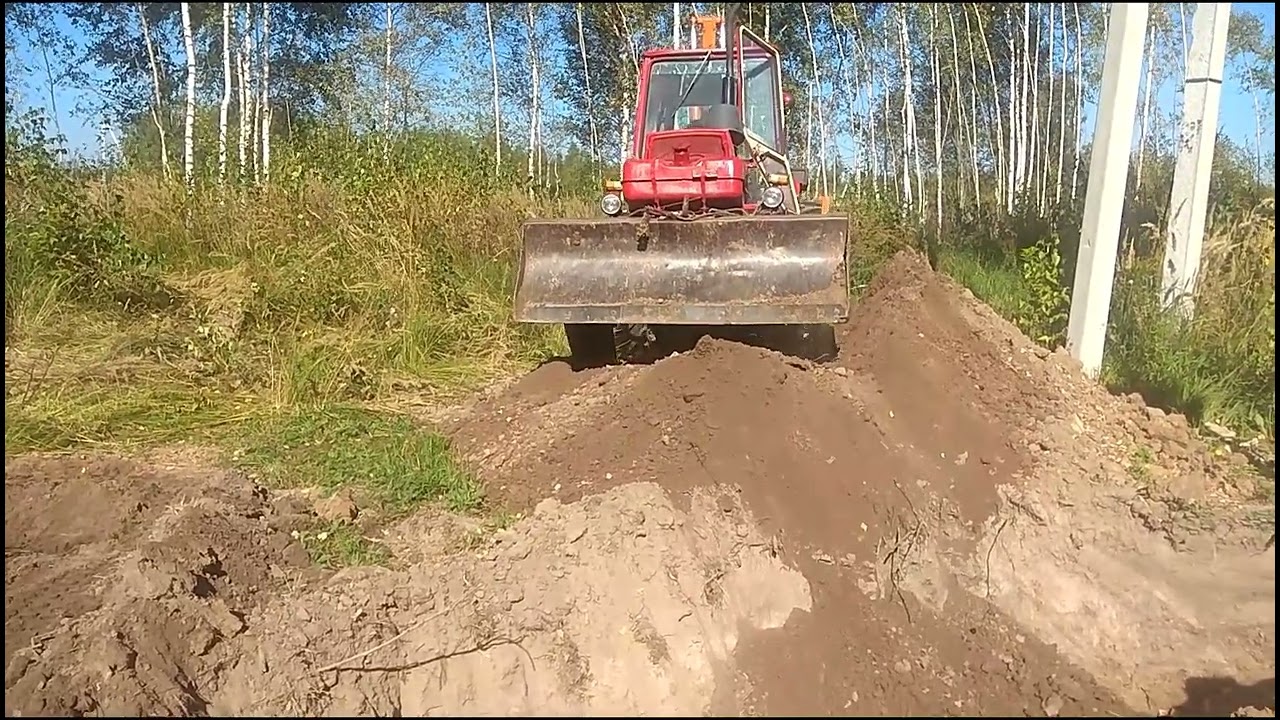 Закапываем траншею экскаватором ЮМЗ (ЭО-2621)