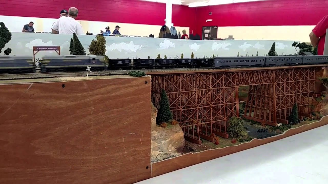Streamlined Steam meets on a high bridge
