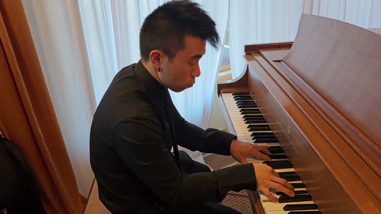 Kyle Playing the Keys for a Hmong Funeral 2024