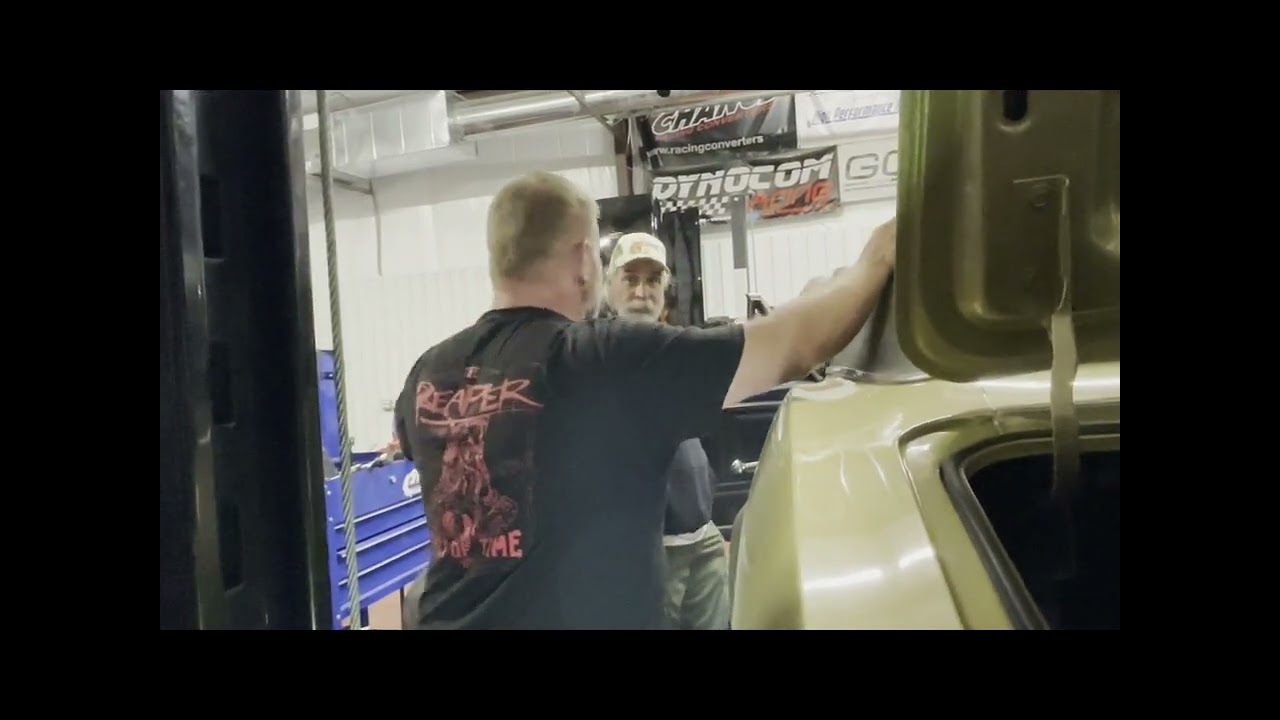 Guess Who Pops in to Check Out the Gold Car?