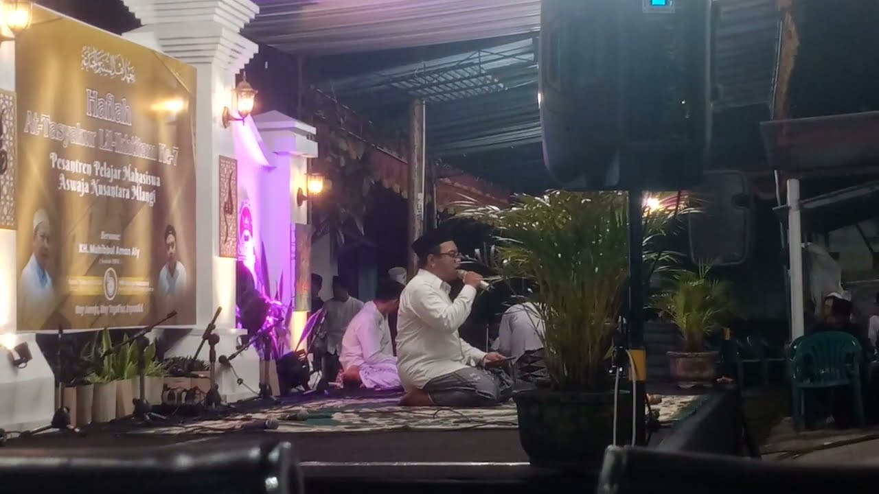 “Melodious recitation of sholawat for Prophet Muhammad, offered by an Indonesian Muslim.”