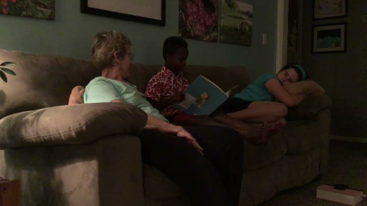 Micah read to Tiger May 2020