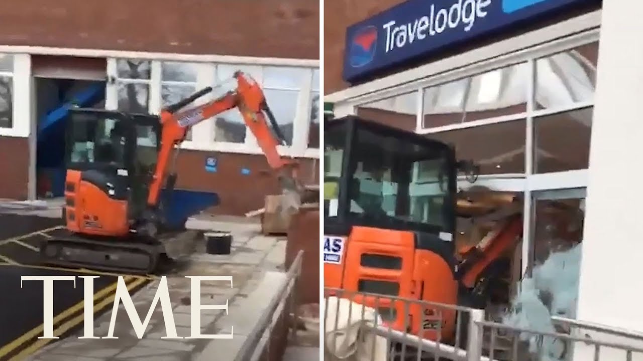Man Exacts Revenge On A Hotel By Running A Digger Through Lobby | TIME
