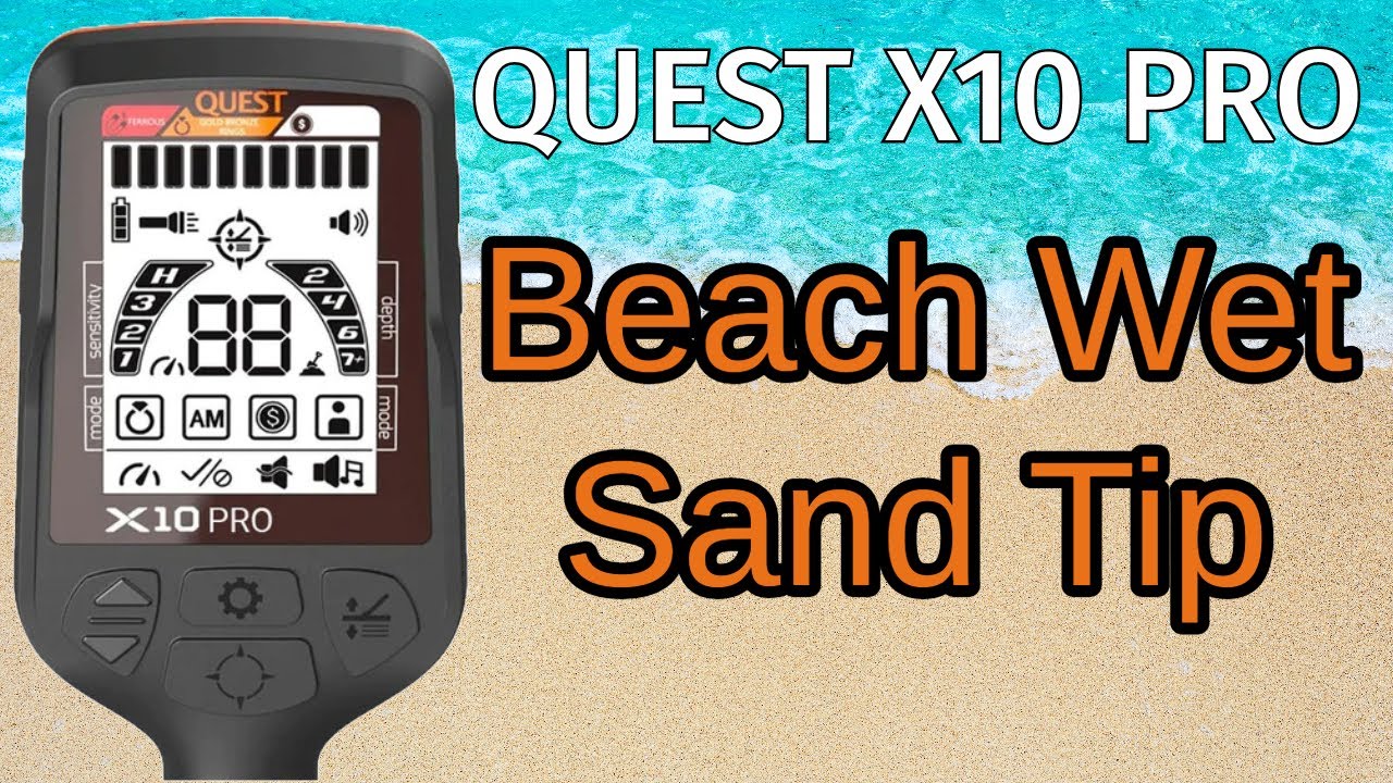 Quest X10 PRO metal detector on the wet sand at beach.