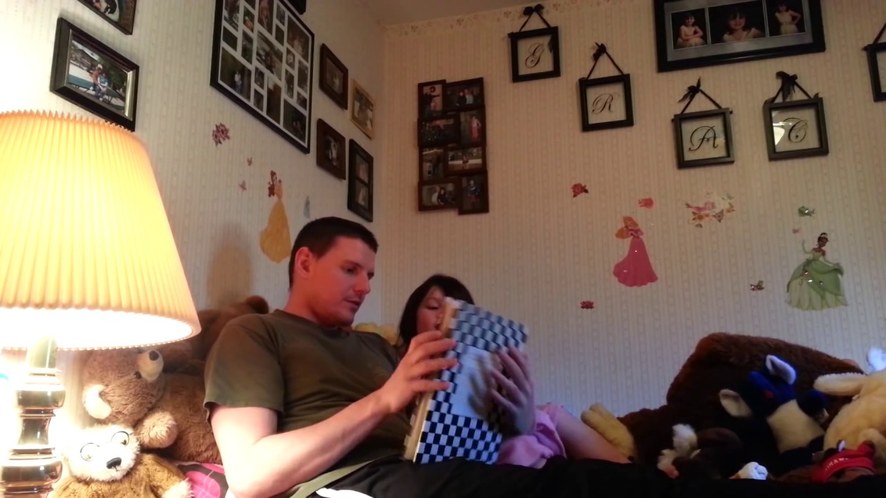 Reading to Gracie February 10 2013 reading to my daughter from mother goose