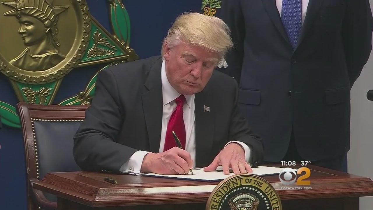 Trump Signs Order Suspending Refugee Program