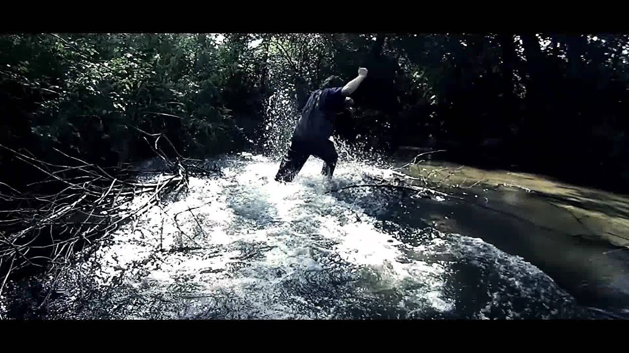 Green chestwaders and black waders, walk in river and mudpol