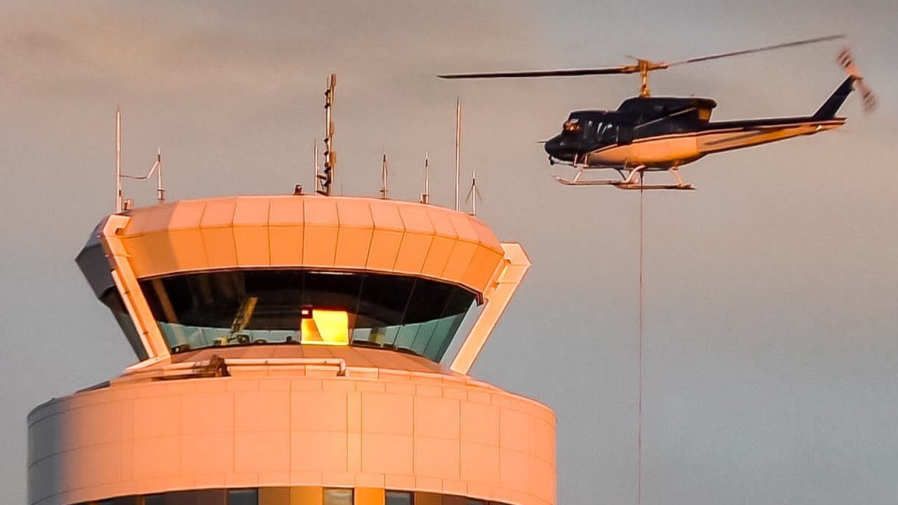 Removing the Ground Radar Antenna on Calgary's Control Tower - With a Helicopter!